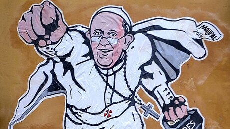 Graffiti mit dem Motiv "Papst Franziskus als Superman" (KNA)