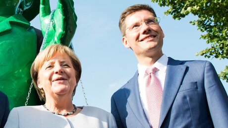 Angela Merkel und Christian Hirte / © Swen Pförtner (dpa)