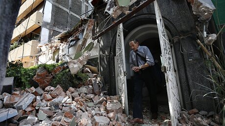 Ein eingestürztes Haus in Mexiko-Stadt / © Marco Ugarte (dpa)