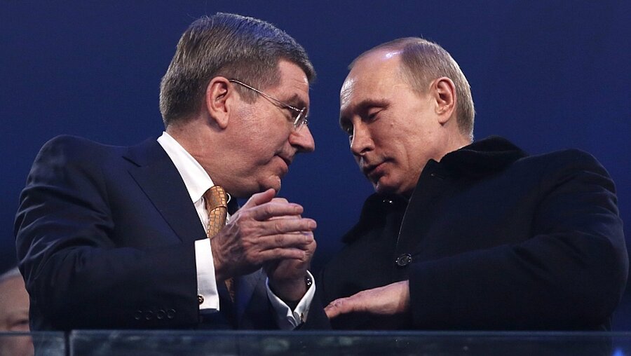 Präsidenten: Bach und Putin (dpa)