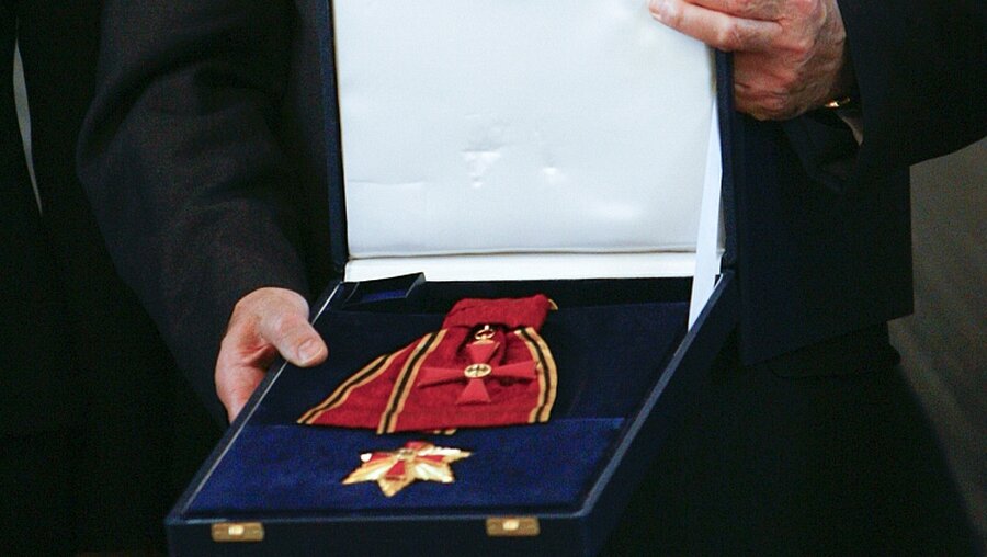 Bundesverdienstkreuz (Symbolbild) / © Johannes Eisele (Reuters)
