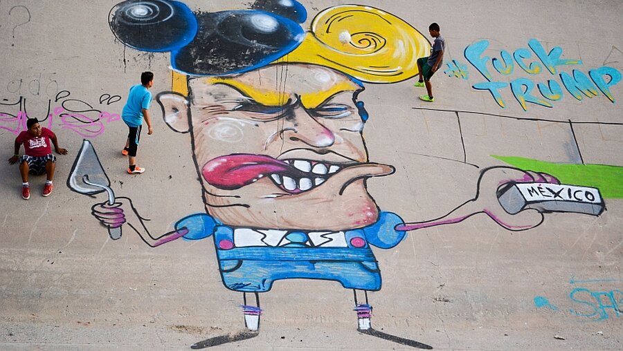 Graffiti-Karikatur von Donald Trump / © Sonia Aguilar (dpa)