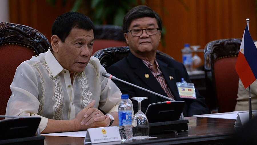 Rodrigo Duterte (l.), Präsident der Philippinen / © Hoang Dinh Nam (dpa)
