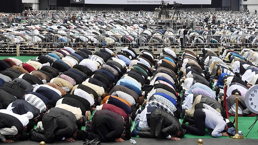 Friedenskonferenz der Ahmadiyya Muslim Jamaat / © Uli Deck (dpa)