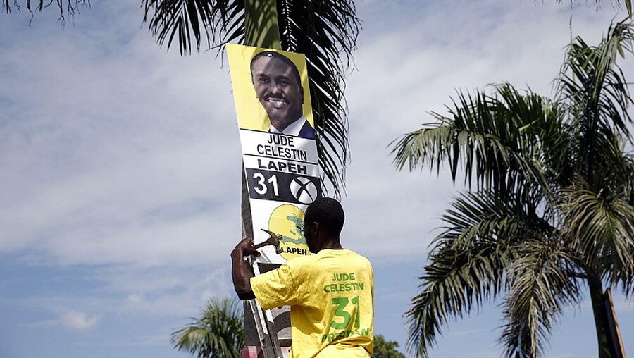 Wahlplakat in haiti / © Orlando Barria (dpa)