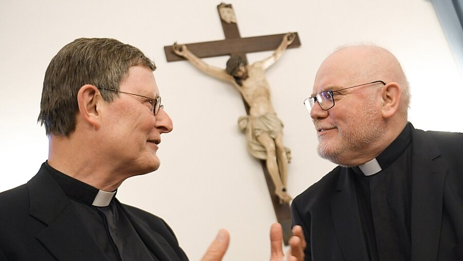 Verschiedene Ansichten: Kardinal Woelki und Kardinal Marx (r.) / © Arne Dedert (dpa)