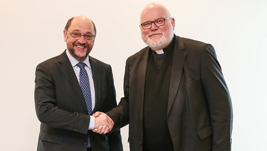 Martin Schulz und Reinhard Kardinal Marx (r.) / © Markus Nowak (KNA)