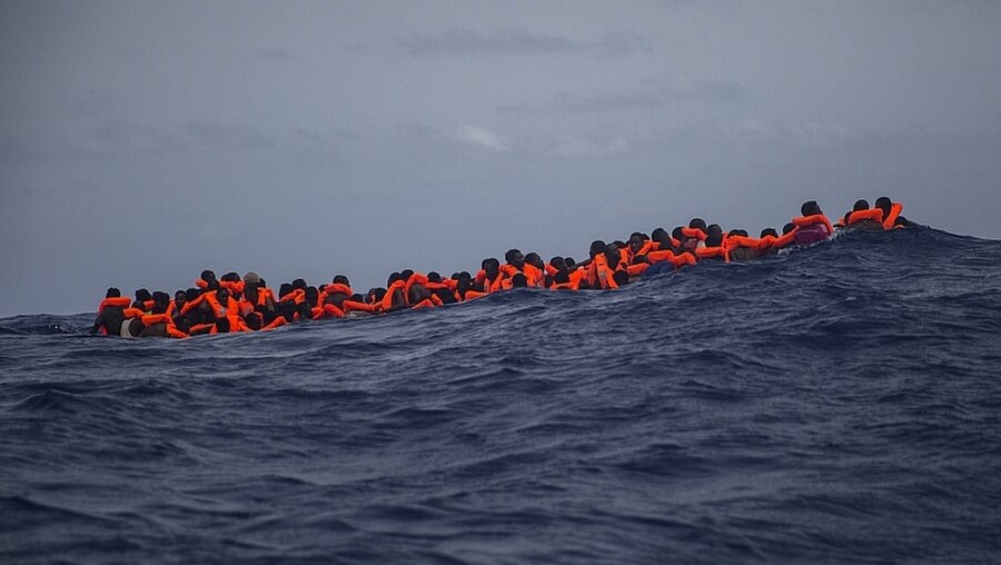 Migranten aus Libyen / © Santi Palacios (dpa)