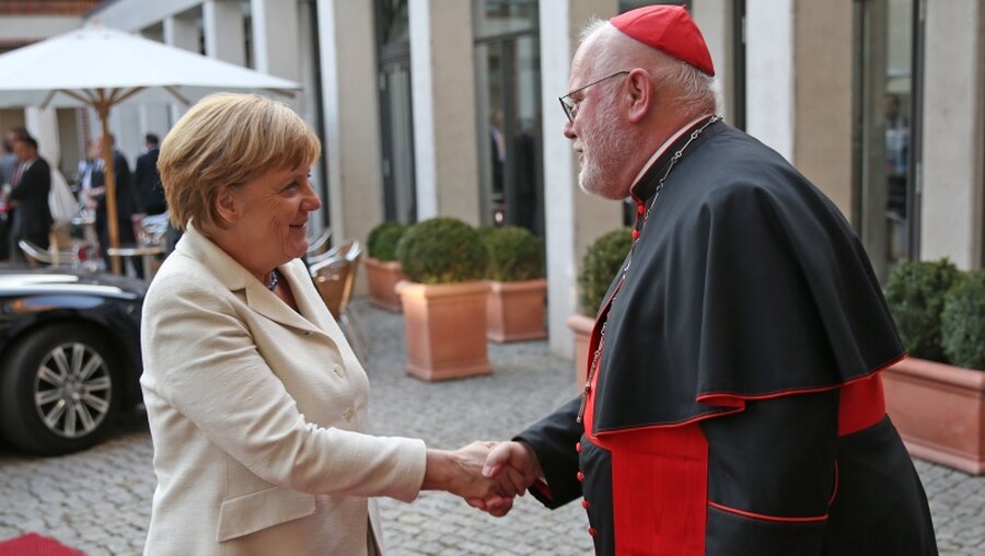 Kardinal Marx empfängt Angela Merkel beim Sankt Michael-Empfang in Berlin / © Markus Nowak (KNA)