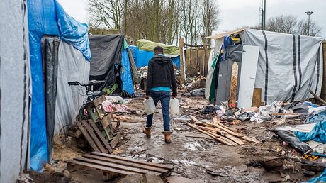Flüchtlingslager in Calais / © Stephanie Lecocq (dpa)