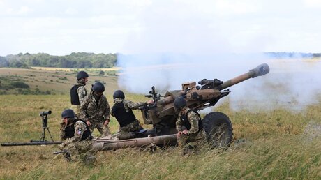 Britische Soldaten und ukrainische Streitkräfte bei einer Übung / © Tim Merry/Daily Express (dpa)