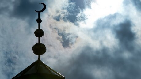 Islam und Kirche / © Boris Roessler (dpa)