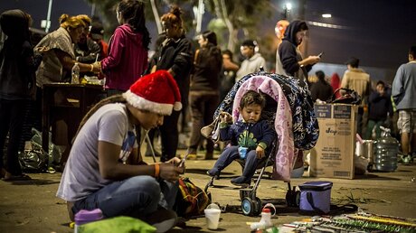 Migranten an der Grenze zu den USA  / © Omar Martinez (dpa)