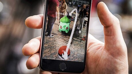 Pokémon Go ist der Renner auf Smartphones / © Remko De Waal (dpa)