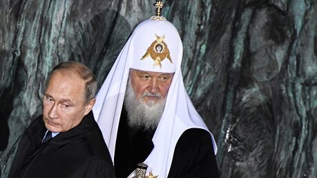 Der russische Präsident Wladimir Putin (l) und Patriarch Kyrill / © Alexander Nemenov (dpa)