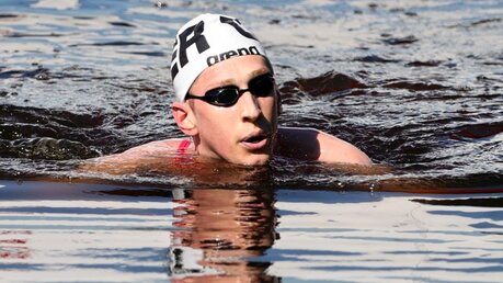 Schwimmer und Olympiasieger Florian Wellbrock / © Oliver Weiken (dpa)