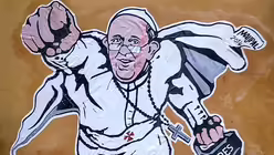 Graffiti mit dem Motiv "Papst Franziskus als Superman" (KNA)