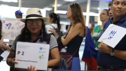 "Diözesanwallfahrt des Erzbistums Köln" steht auf dem Willkommens-Plakat der Panameña / © Katharina Geiger (DR)