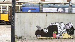 Graffito von Papst Franziskus als Bettler / © Stefania Malapelle (KNA)
