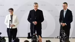 Das neue DBK-Dreigestirn: Gilles, Wilmer, Kopp / &copy; Daniel L&ouml;b (dpa)