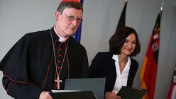 Kardinal Rainer Maria Woelki und Staatssekretärin Jacqueline Kraege (dpa)