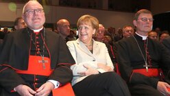 Kardinal Marx, Angela Merkel und Kardinal Woelki (KNA)