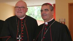 Kardinal Marx und Nuntius Eterovic (KNA)