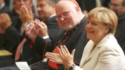 Sankt Michael-Jahresempfang: Applaus von der Kanzlerin (KNA)